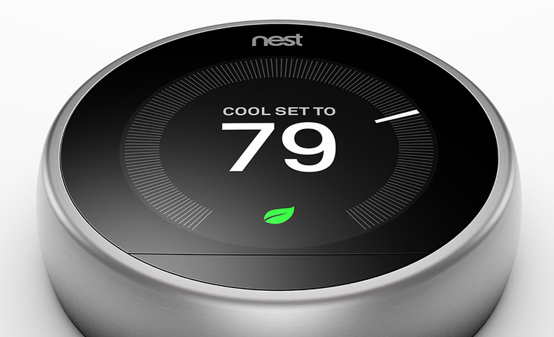 Nest Learning Thermostat on a white background