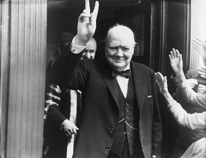Winston Churchill, showing making a Victory sign