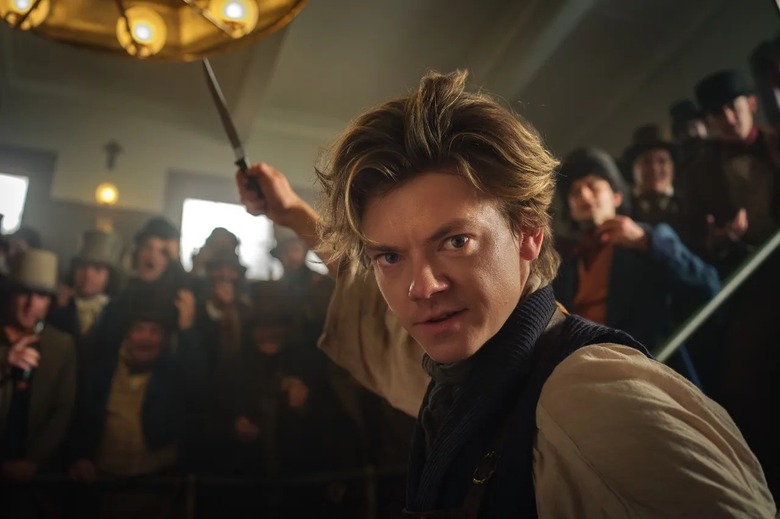 Thomas Brodie-Sangster as the Artful Dodger.