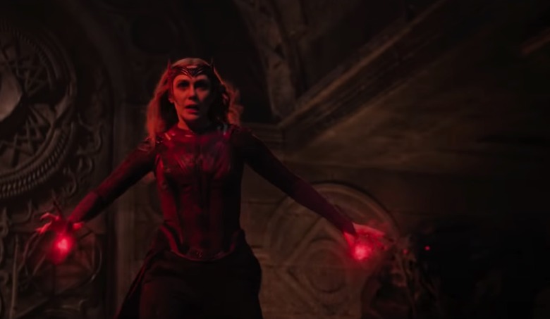 Wanda in the foreground with a monster behind her