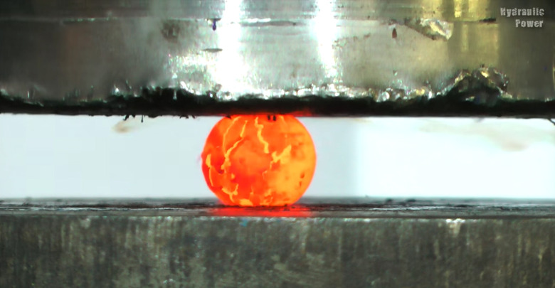 hydraulic-press-red-hot-nickel-ball