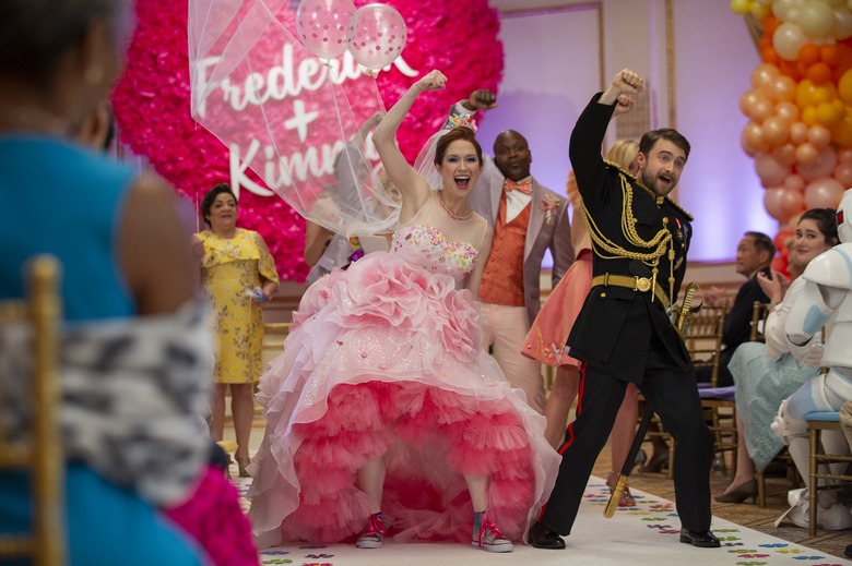 Ellie Kemper and Daniel Radcliffe in Unbreakable Kimmy Schmidt: Kimmy vs. the Reverend.