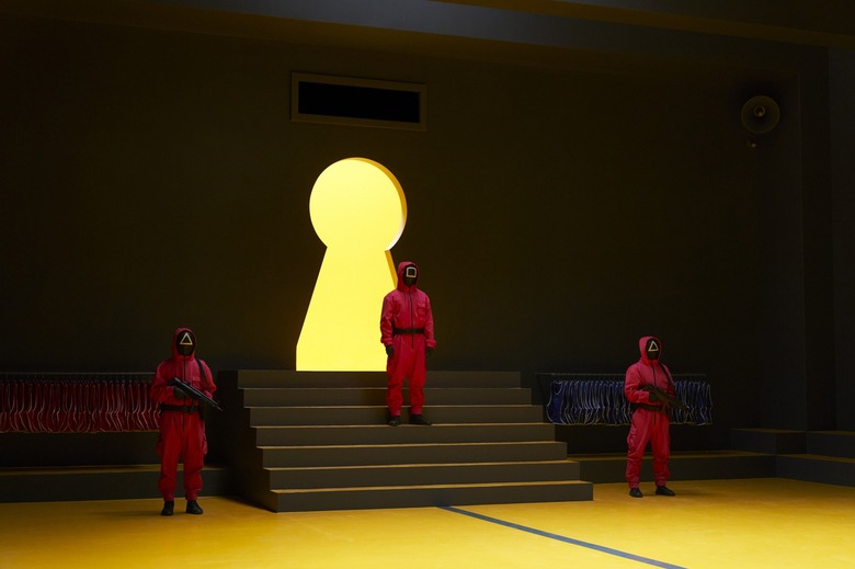 Guards patrolling in Squid Game season 3.