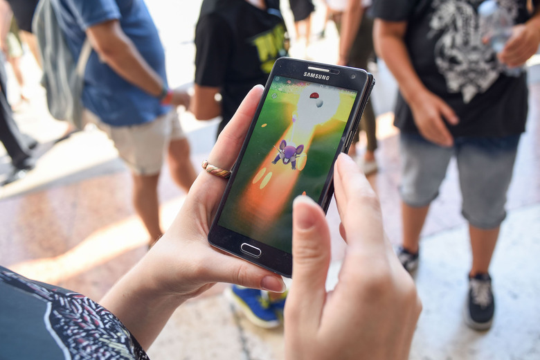 Hunting Pokemon in Cathedral Square, Milan, Italy - 01 Aug 2016
