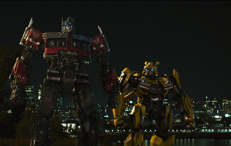 (L-R) Arcee, Optimus Prime and Bumblebee in Transformers: Rise of the Beasts.