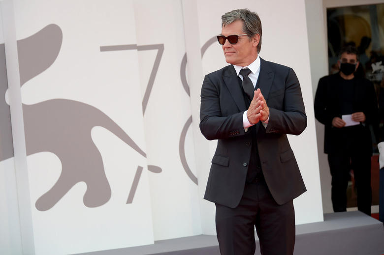 josh brolin in a suit and sunglasses