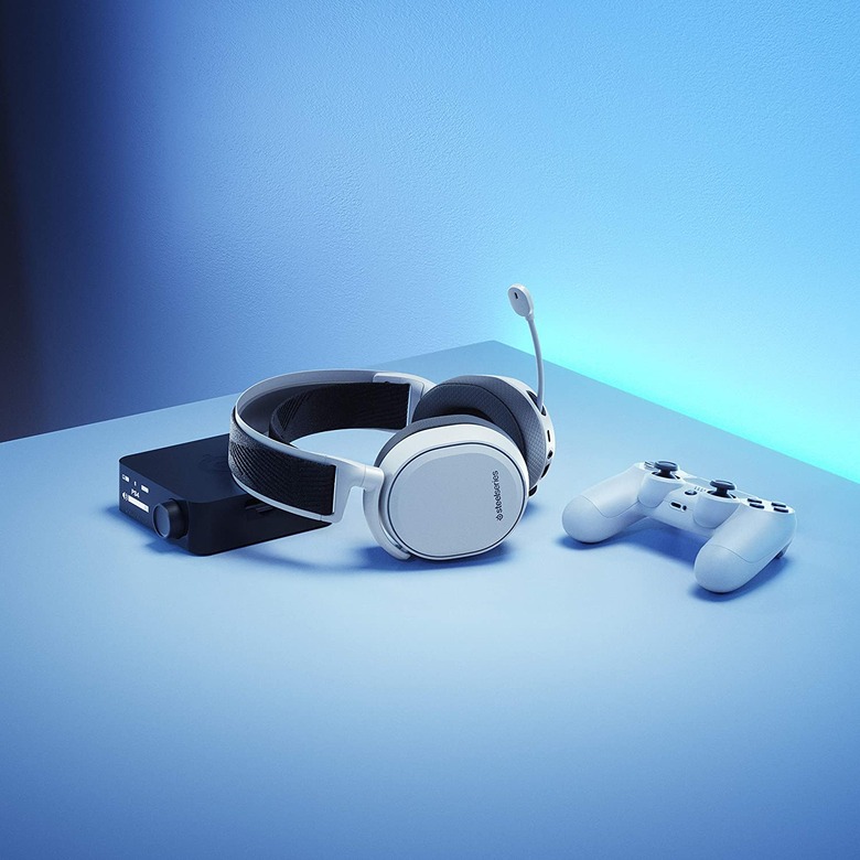 A SteelSeries Arctic Pro headset with a controller.