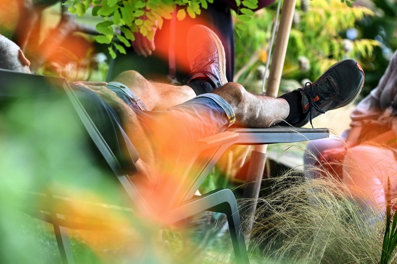 A man relaxes on a lounger at the Landesgartenschau on the shores of Lake Constance.