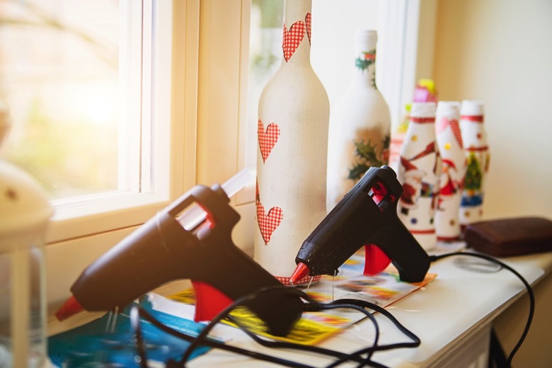 Glue guns on a shelf