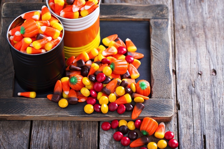 Halloween candy corn in two jars.