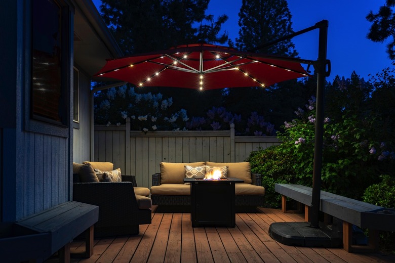 A garden umbrella with lights.