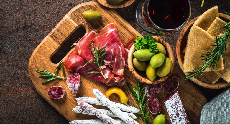 Meat and other products on a kitchen table
