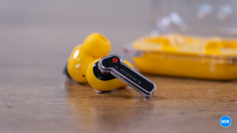 Nothing Ear (a) earbuds outside the charging case