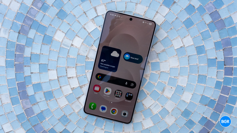 Front of the Samsung Galaxy S25 Edge on a blue table.