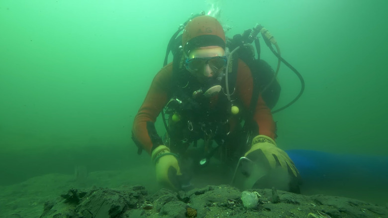 divers uncover ancient greek shipwreck and other relics