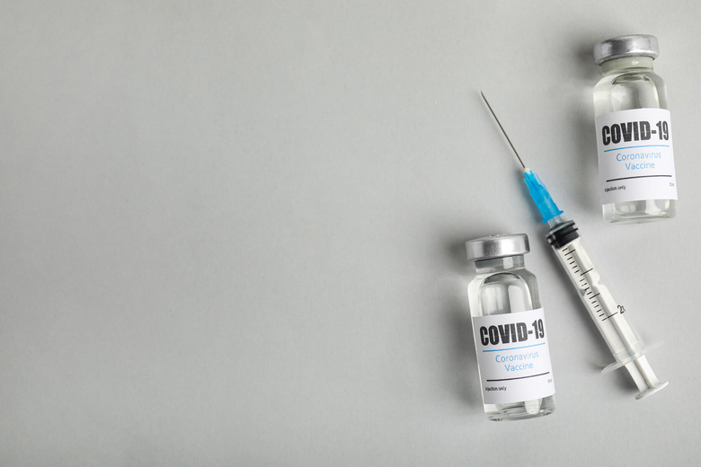 coronavirus vaccine shot and vials