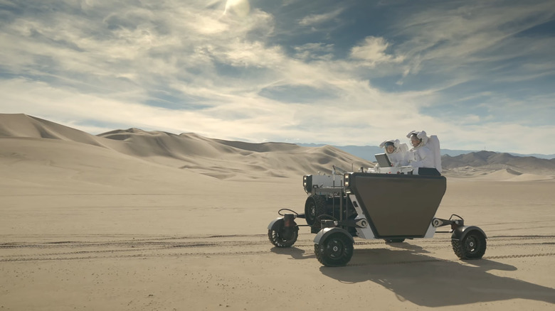 astronauts-riding-flex-rover