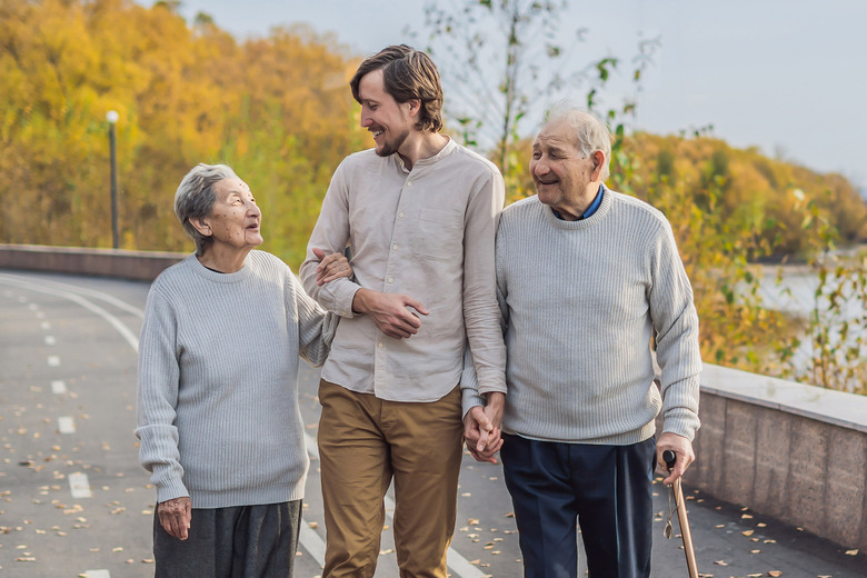 elderly with young man, why humans shrink