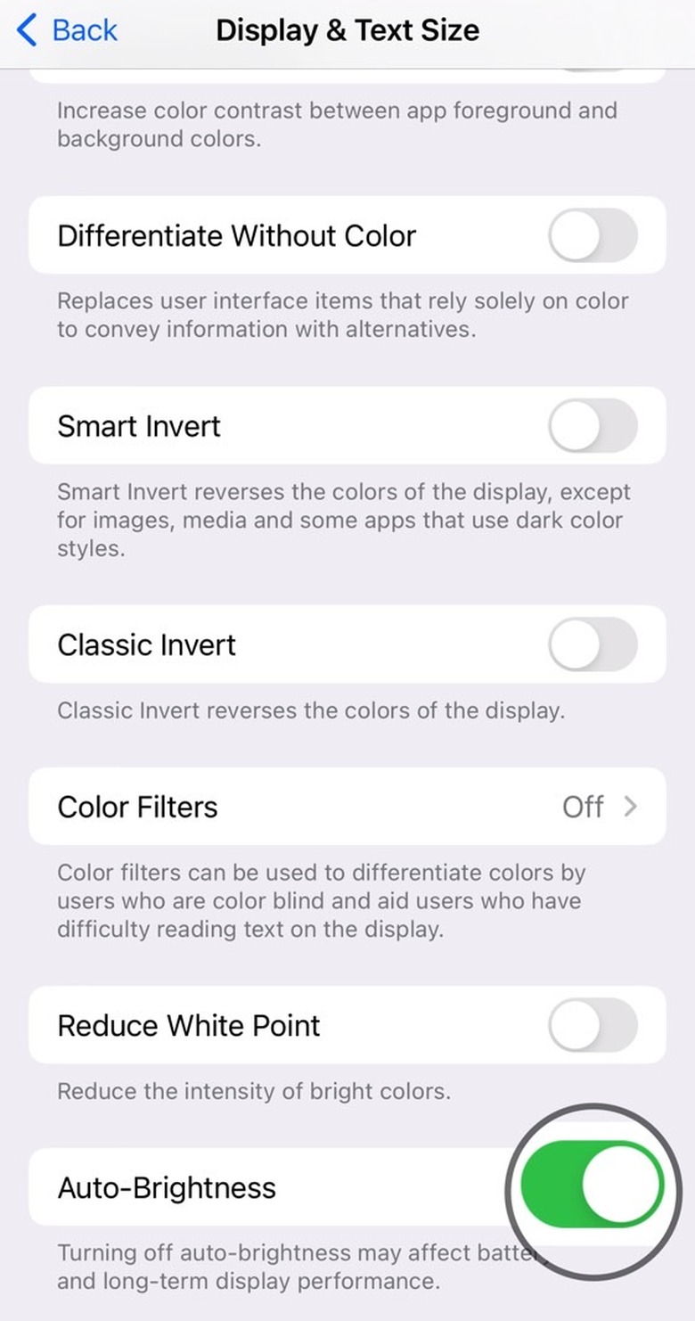 Enable screen auto-brightness on iPhone.
