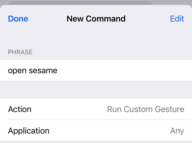 You can associate a custom voice command with a custom touch screen gesture in iOS.