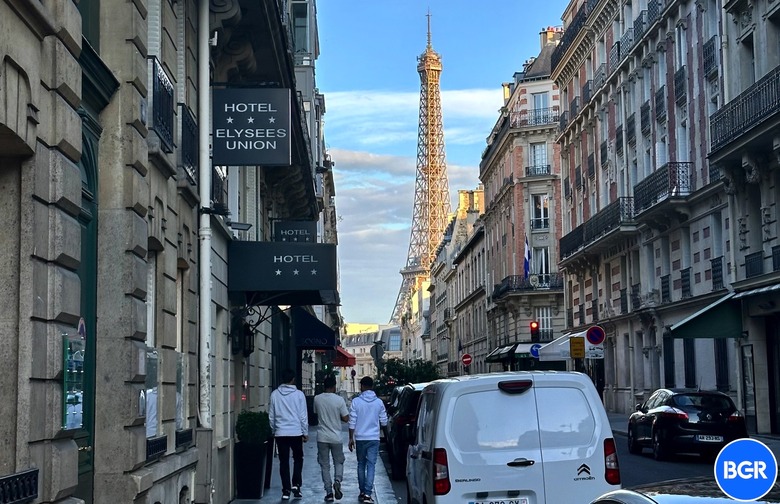 The Eiffel Tower seen from a street in Paris, France.