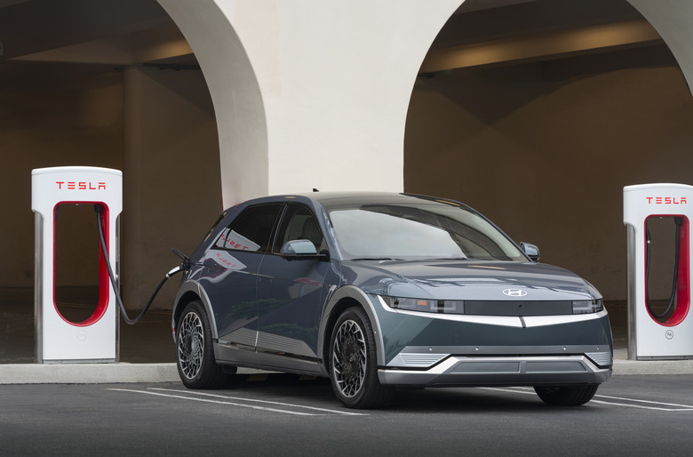 Hyundai with a Tesla Supercharger