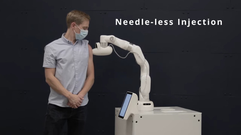 Cobi robot performs needle-less injection