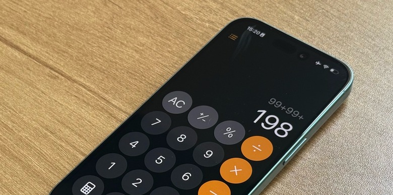 iPhone 16 with Calculator app opened