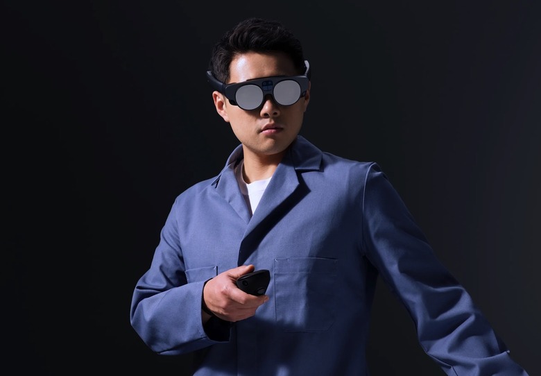 A person using the Magic Leap 2 mixed reality headset.