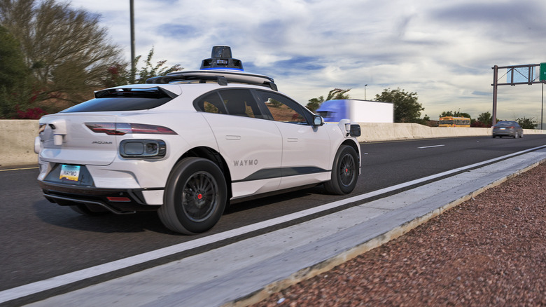 Waymo One I-PACE on a freeway