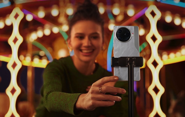 A person using Social Turbo AI features on the Tecno Camon 30 5G.