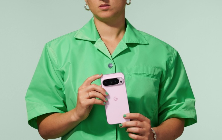 A person holding the Pixel 9 Pro.