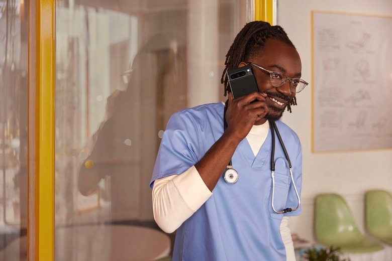 A person using a Pixel 8 Pro to make a call.