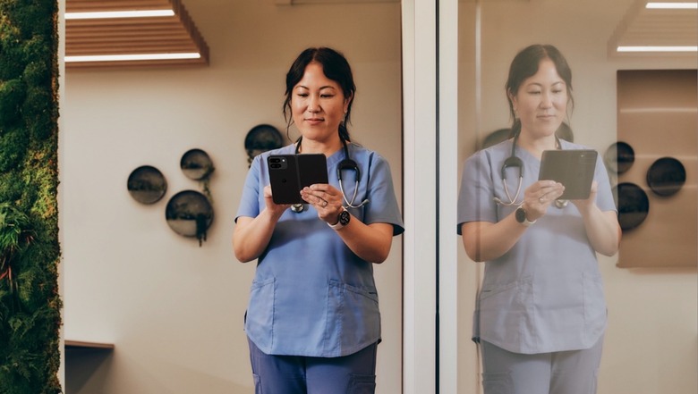 A person using the Pixel 9 Pro Fold unfolded.