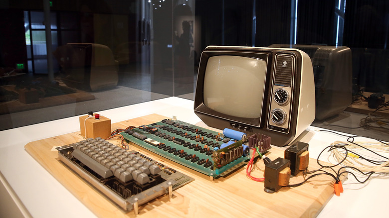 The Apple 1 computer hooked to a TV and keyboard in a display case