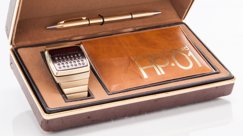 The HP-01 watch in its leather case