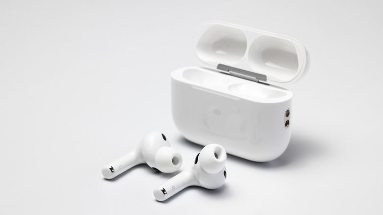 The Apple AirPods Pro 3 wireless earbuds with their charging case on a white surface.