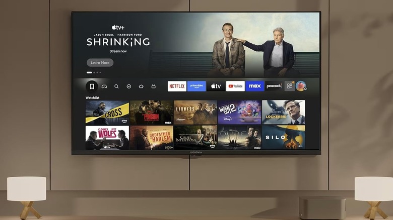 The Insignia F50 Series 4K TV mounted on a wall.