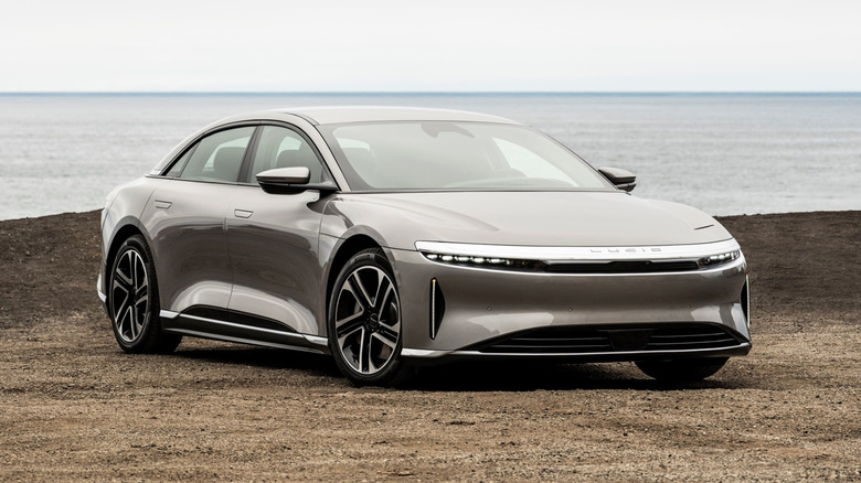 Lucid Air parked near a beach on a cloudy day