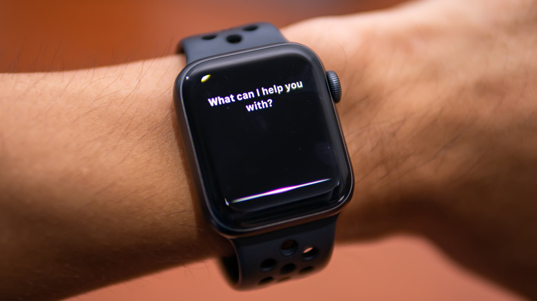 Siri on an Apple Watch, responding to a person's voice commands.
