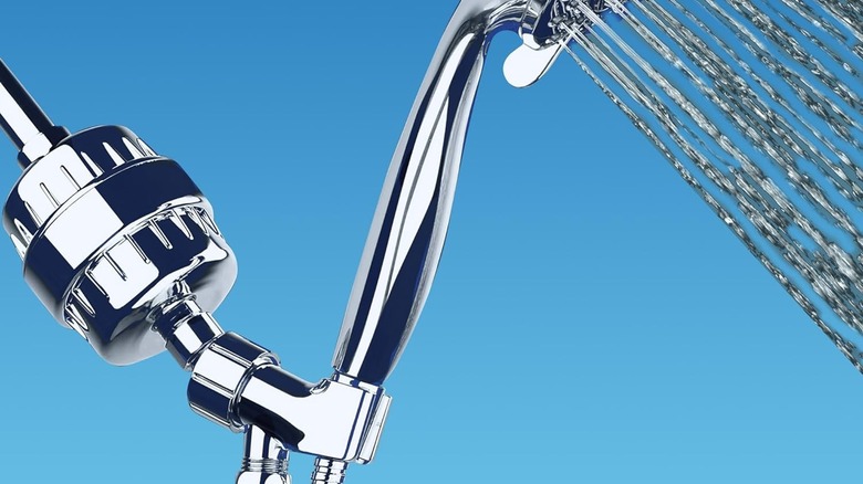 AquaBliss shower filter attached to a shower while water is coming out