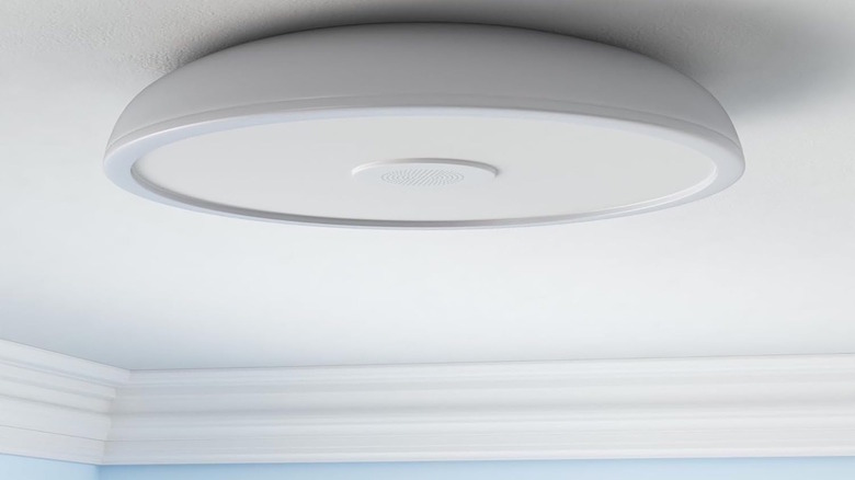 Asall smart light at the top of a bathroom