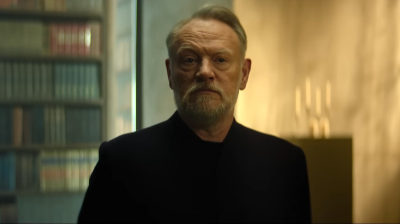 Jared Harris as Hari Seldon standing in his office library