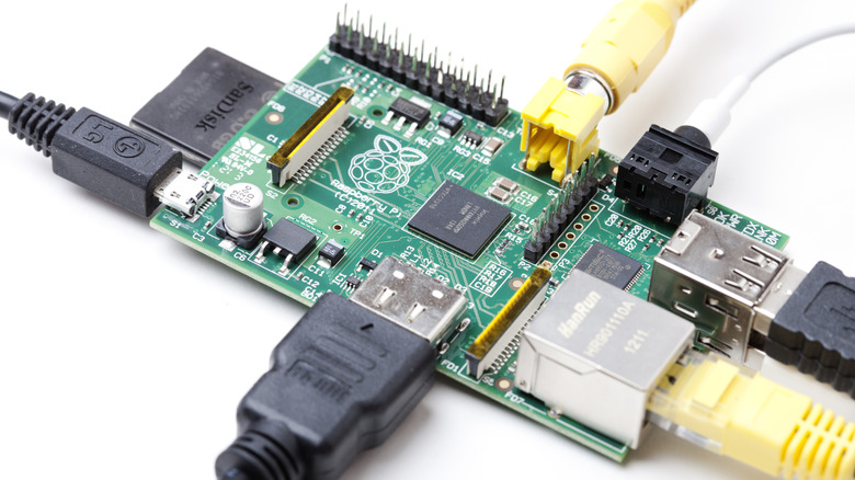 Raspberry Pi with black case partially opened