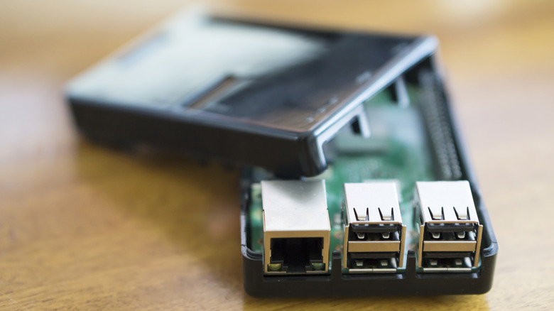 Raspberry Pi with cables connected to all its ports
