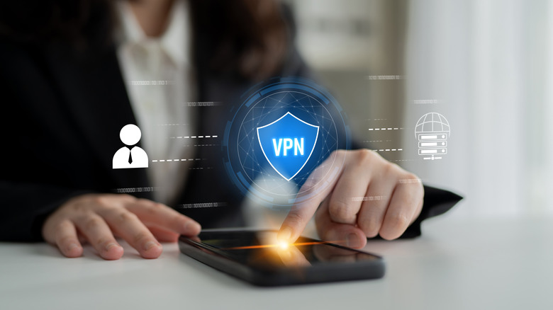 Person in background with graphic concept of VPN protecting a smartphone