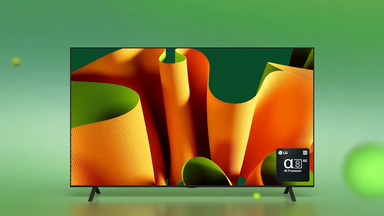The LG B4 TV on a stylized green background
