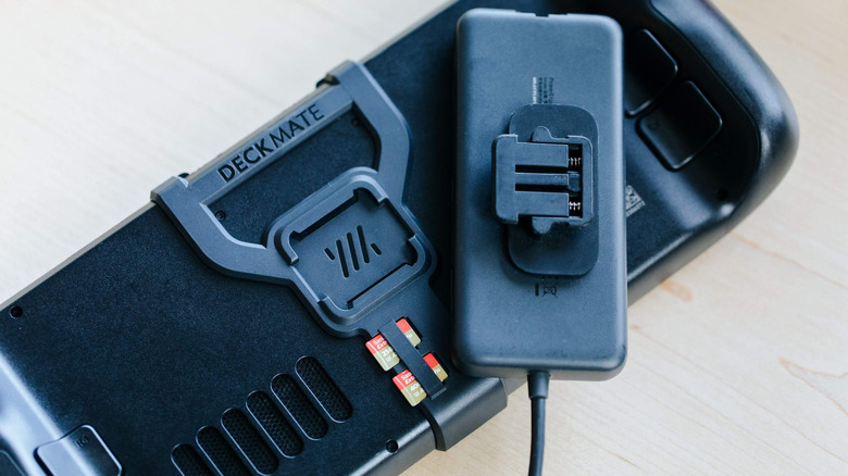 The Deckmate mount attached to the back of a Steam Deck