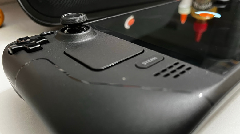 Angled view of the Steam Deck, emphasizing the thumbstick