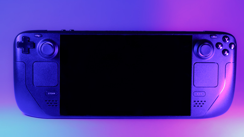 Photo of a Steam Deck in colorful lighting